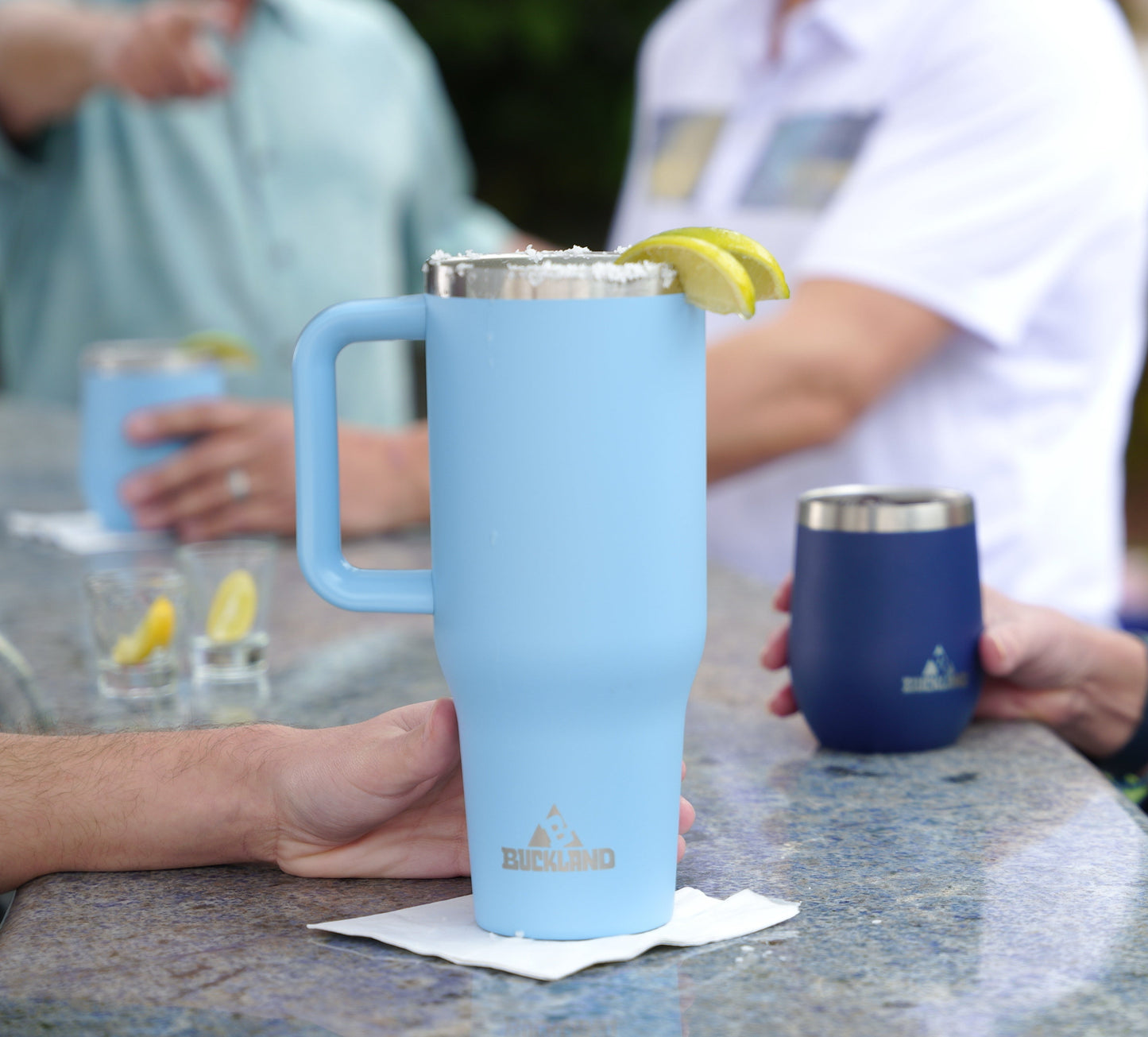 40oz Tumbler made into a large cocktail being served at a bar.