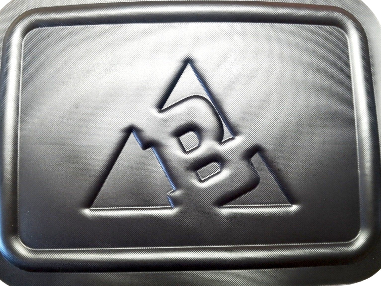 "25-liter insulated backpack cooler in black with multiple pockets for camping and hiking adventures"